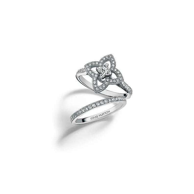 Louis Vuitton Eternité wedding band in white gold and diamonds, and Les Ardentes engagement ring in white gold and diamonds, set with a patented Louis Vuitton Flower-cut diamond.
